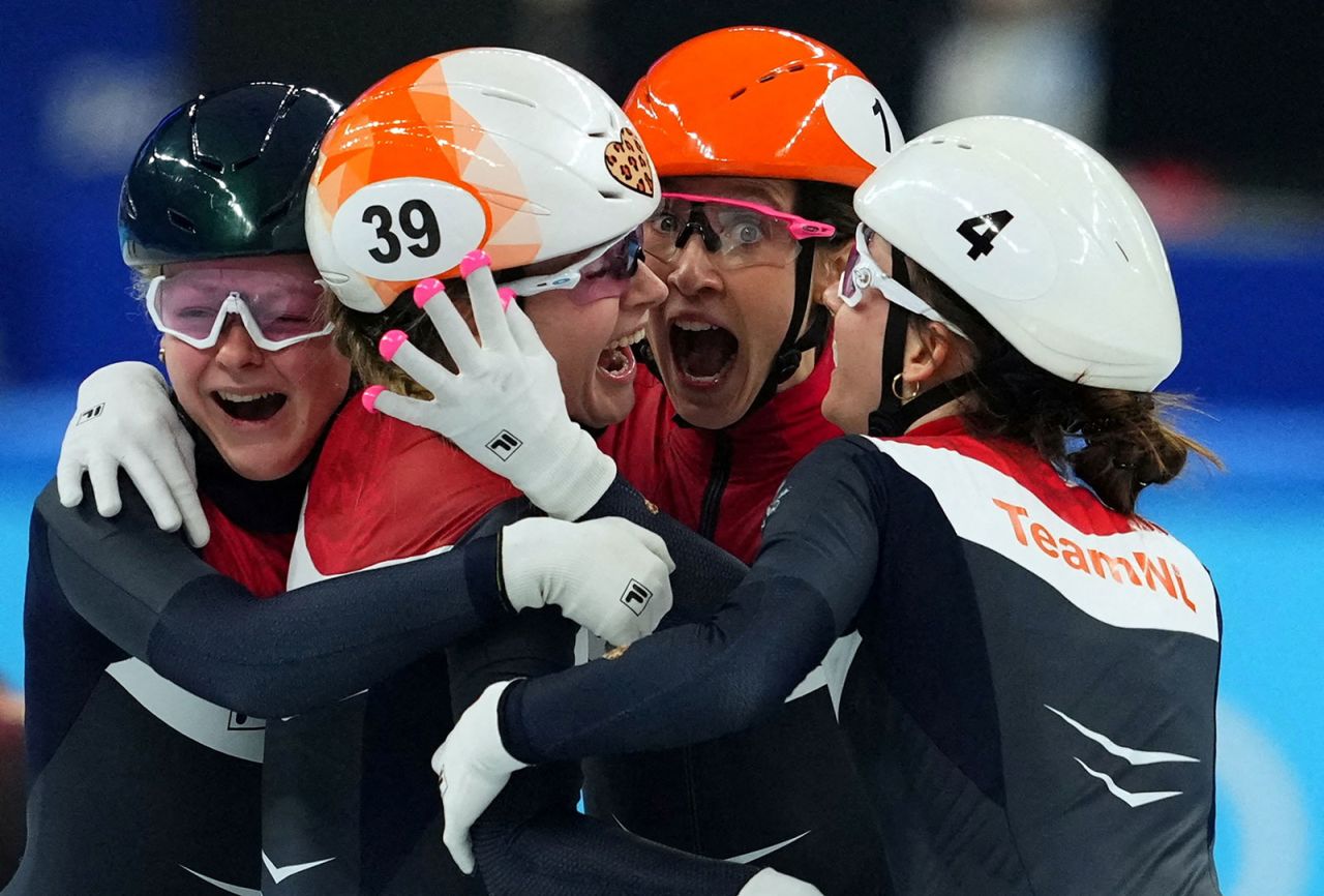 Dutch speedskaters Xandra Velzeboer, Suzanne Schulting, Selma Poutsma and Yara Van Kerkhof react after winning gold in the 3,000-meter short track relay on February 13. They also set an Olympic record in the race.