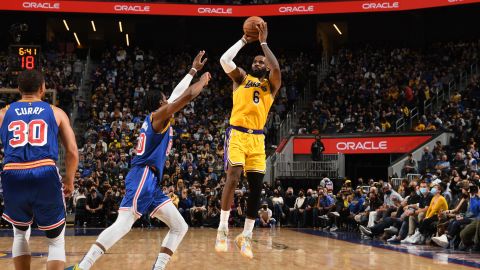 LeBron James of the Los Angeles Lakers shoots a 3-pointer in a game against the Golden State Warriors on February 12.