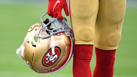 A 49ers player holds his helmet during the NFL game between the San Francisco 49ers and the Los Angeles Rams on January 9.