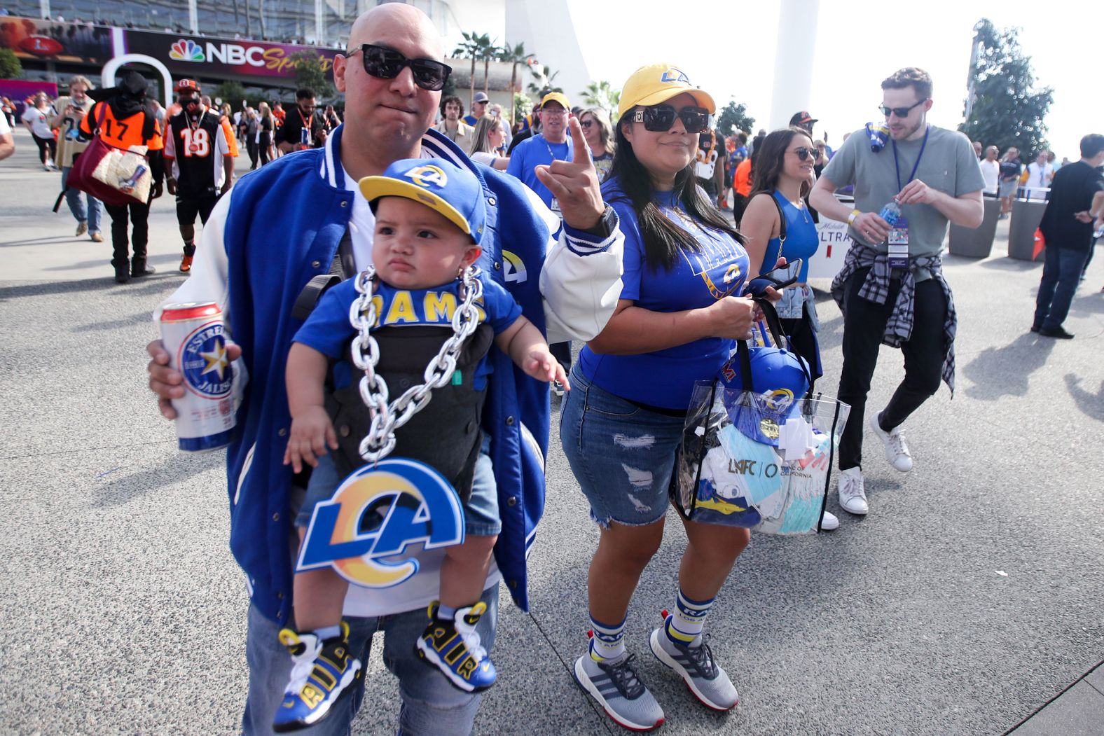 A young fan shows his support for the Rams outside SoFi Stadium.