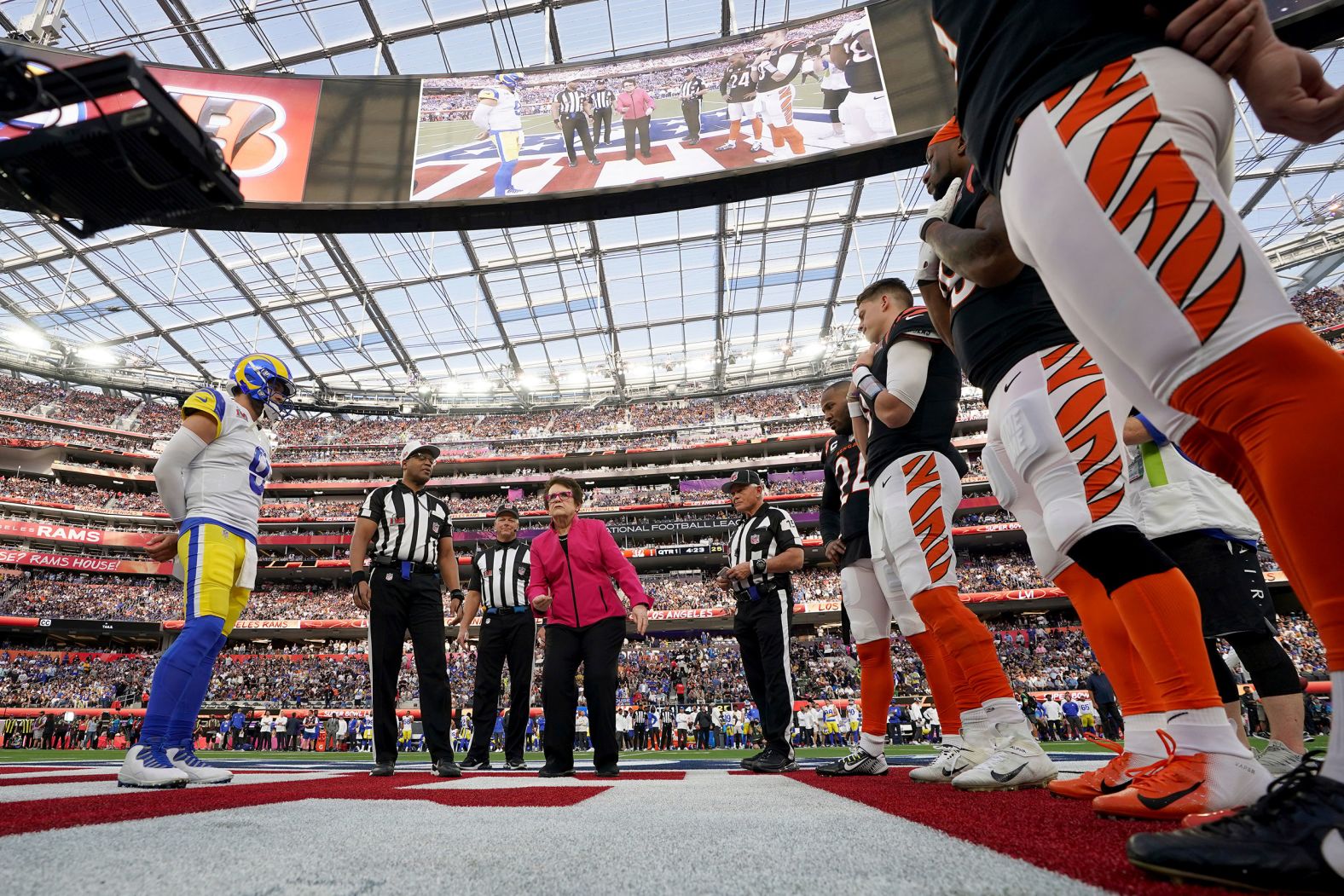 Tennis great Billie Jean King performs the pregame coin toss.