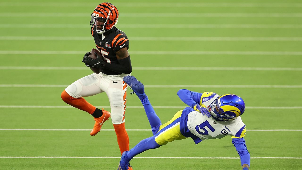 Cincinnati Bengals receiver Tee Higgins catches the ball over Los Angeles Rams defensive back Jalen Ramsey for a touchdown in the third quarter of Super Bowl LVI. 