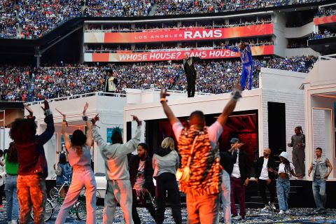 Rappers Snoop Dogg, top right, and Dr. Dre perform a the start of the <a href="http://www.cnn.com/2022/02/13/entertainment/gallery/halftime-show-photos-super-bowl-lvi/index.html" target="_blank">Super Bowl halftime show</a> on Sunday, February 13. The show also featured singer Mary J. Blige and rappers Eminem, Kendrick Lamar and 50 Cent.