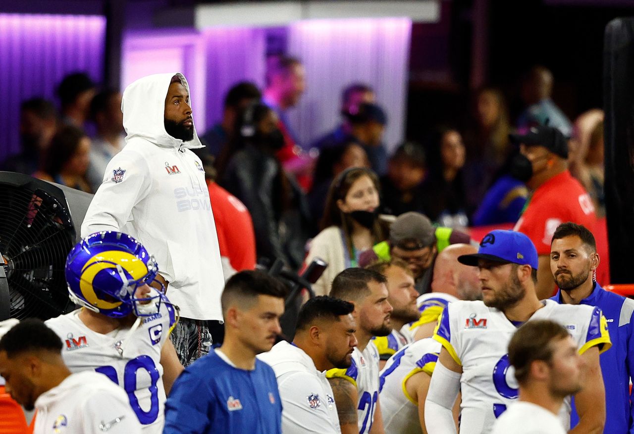 Rams wide receiver Odell Beckham Jr., top left, watches from the bench after being knocked out of the game with a knee injury.