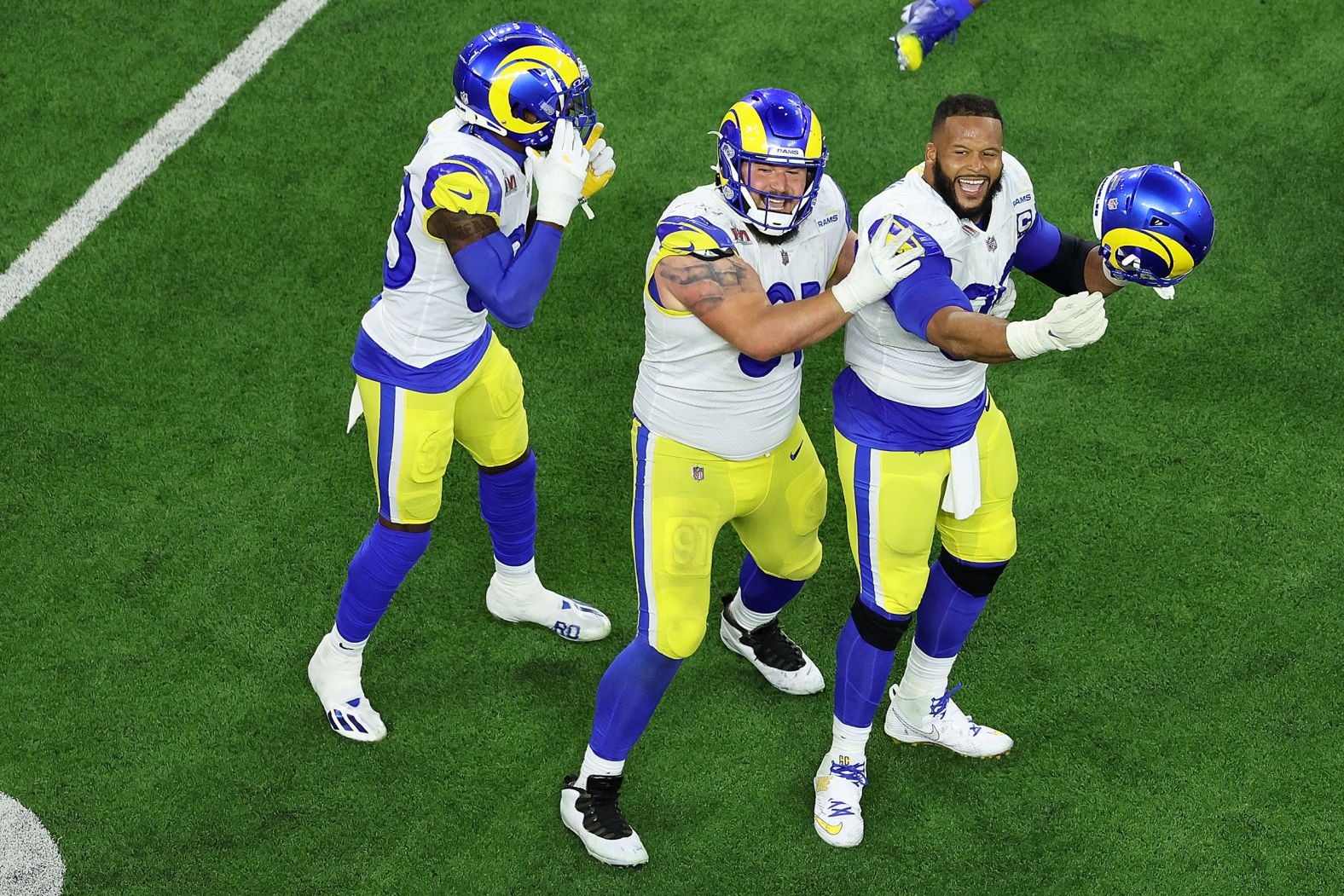 Donald, right, celebrates with teammates after the Bengals' final drive.