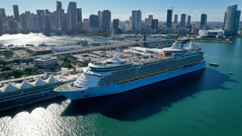 A cruise ship waits for people to embark before leaving PortMiami on December 31, 2021, in Miami, Florida. 