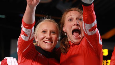 Humphries (L) celebrating after winning Olympic gold for Canada in Vancouver 2010.