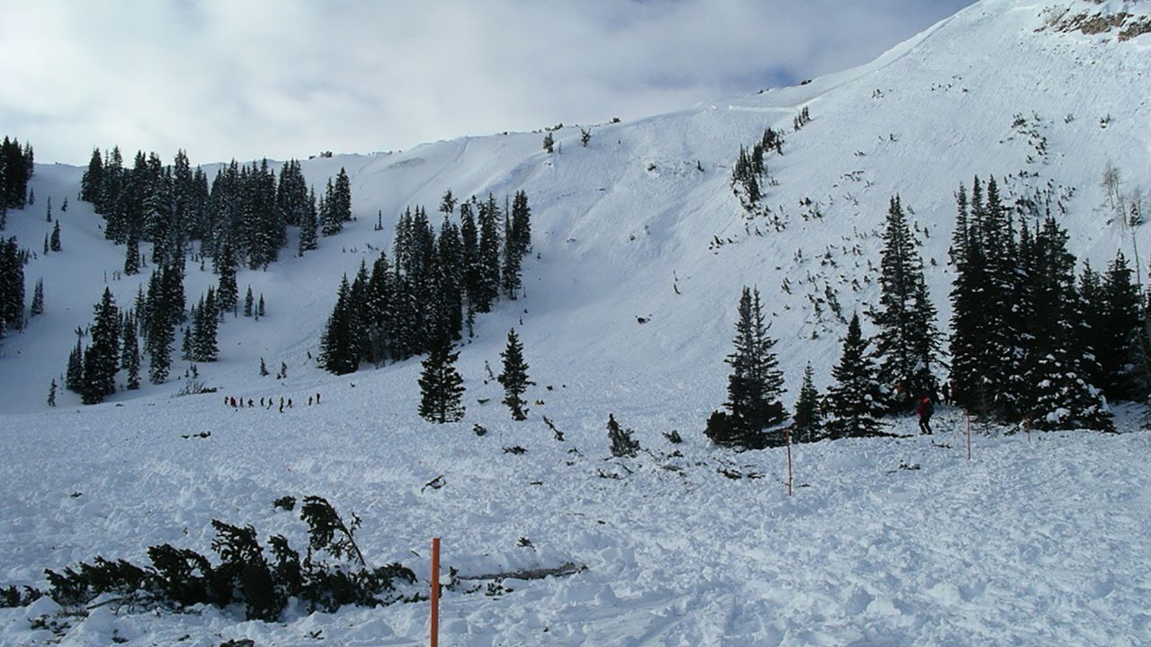 Rescuer Jake Hutchinson took this picture after the Dutch Draw avalanche in 2004. He says you can see the fracture line on the slope above and part of the debris field.