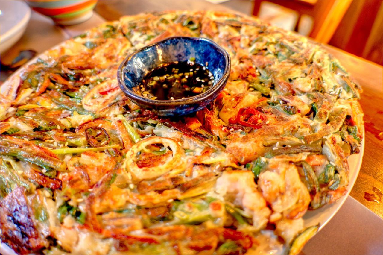 <strong>Kimchi pancakes, Korea: </strong>The Korean side dish of fermented vegetables is much-loved in Korea along with the rest of the world.