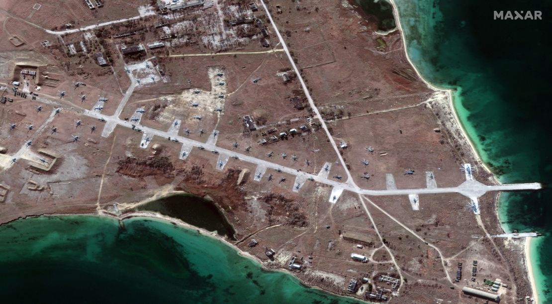 Satellite images taken on February 13 show at least 60 helicopters on the northern portion of the previously unused military base in Crimea.