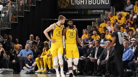 Evans and Domantas Sabonis look on against the Boston Celtics during Game Four of round one of the 2019 NBA Playoffs.