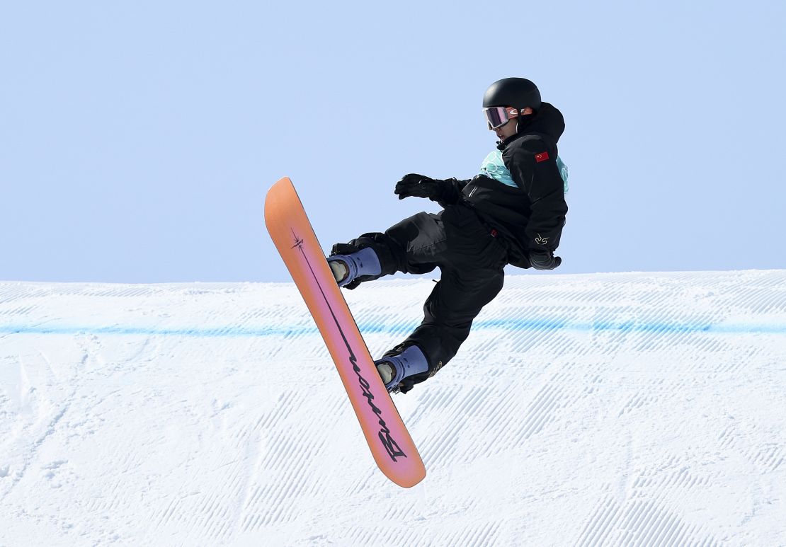 Su performs a trick during the men's snowboard big air final,