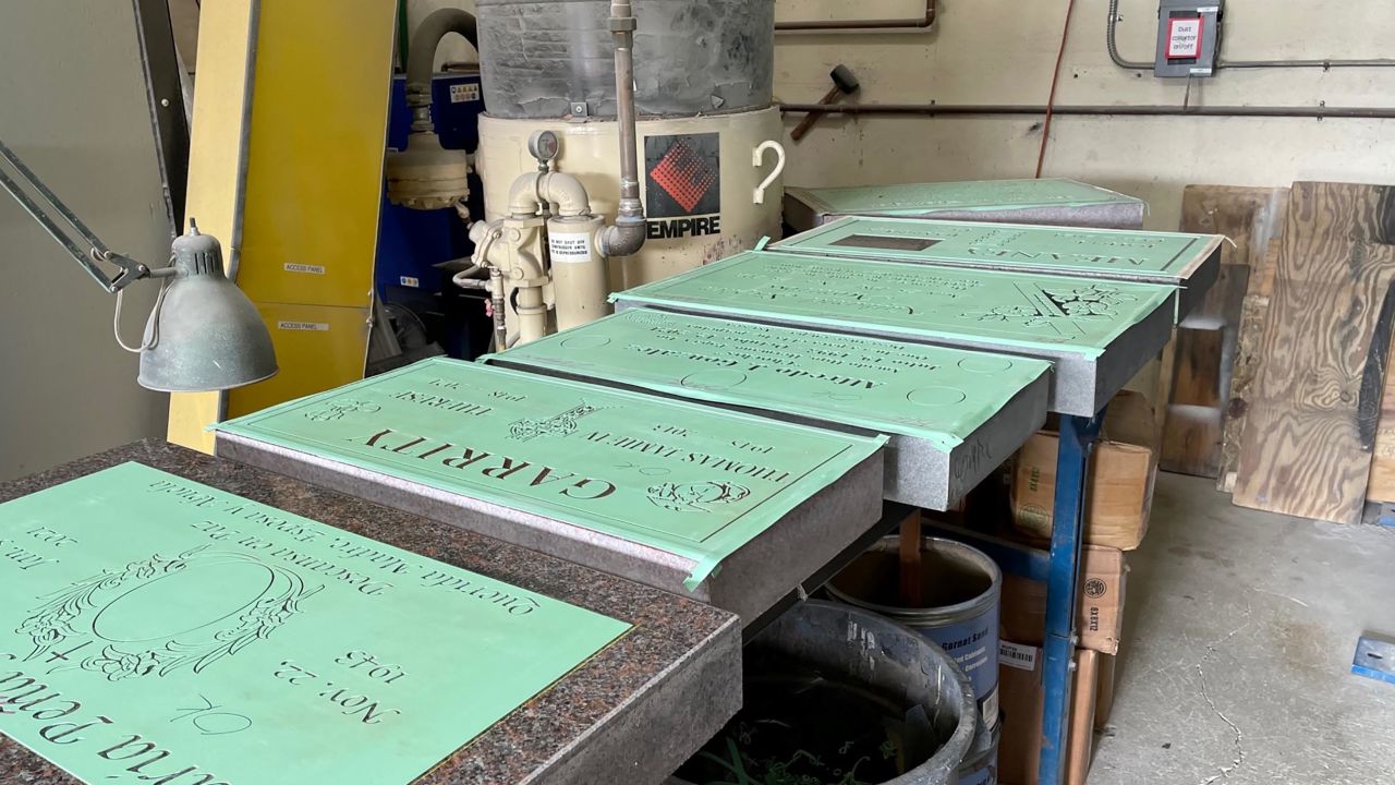 Footstones at Santa Barbara Monumental in California are prepared for engraving.
