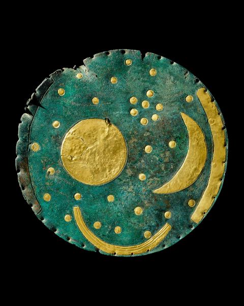 The Nebra Sky Disc was unearthed in Germany and is about 3,600 years old. It's the earliest known depiction of the cosmos. The artifact's inlaid gold is from Cornwall, England, showing the world at that time was deeply interconnected. Photo courtesy of the State Office for Heritage Management and Archaeology Saxony-Anhalt, Juraj Lipták