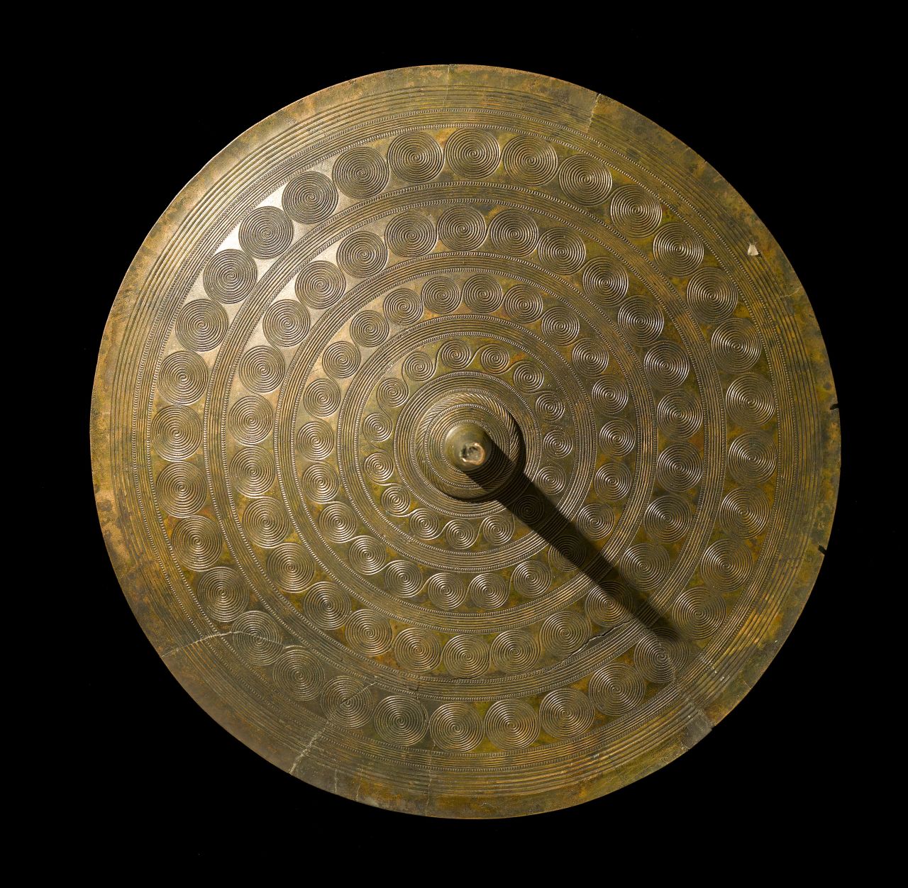 This decorated sun disc, found in Denmark, would have been attached to a woman's belt about 3,400 years ago. 