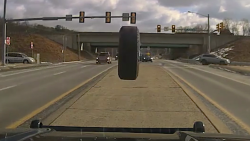runaway tire smashes police windshield orig as_00000310.png