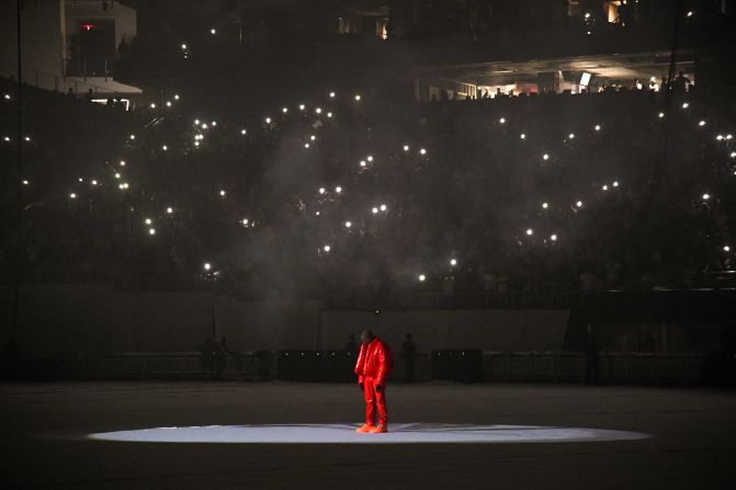 West appears at a listening event for his new album, "Donda," at Atlanta's Mercedes-Benz Stadium in 2021. West was <a href="index.php?page=&url=https%3A%2F%2Fwww.cnn.com%2F2021%2F07%2F28%2Fentertainment%2Fkanye-west-mercedes-benz-stadium%2Findex.html" target="_blank">staying at the venue</a> to complete the album. 