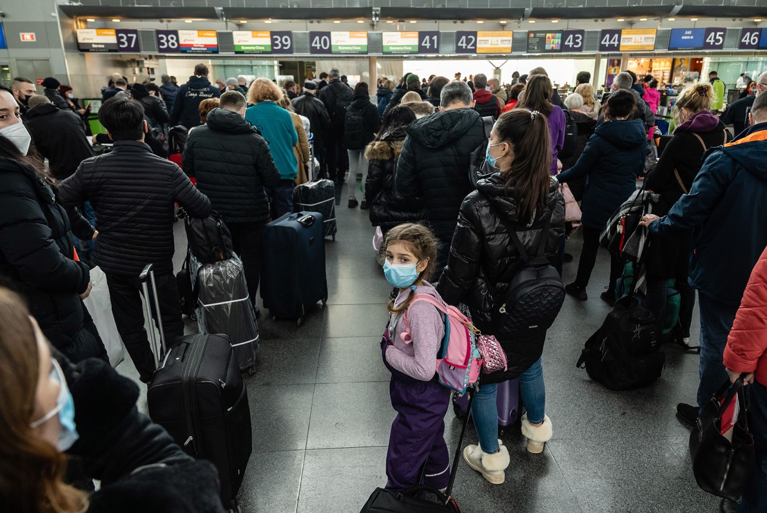 Travelers wait in line to check in to their departing flights February 15 at the Boryspil International Airport outside Kyiv. US President Joe Biden<a href="index.php?page=&url=https%3A%2F%2Fwww.cnn.com%2F2022%2F02%2F10%2Fpolitics%2Fbiden-ukraine-things-could-go-crazy%2Findex.html" target="_blank"> urged Americans in Ukraine to leave the country,</a> warning that "things could go crazy quickly" in the region.