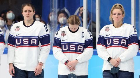 Alex Carpenter, Kendall Coyne Schofield and Amanda Kessel line up for their silver medals after the women's ice hockey gold medal match.
