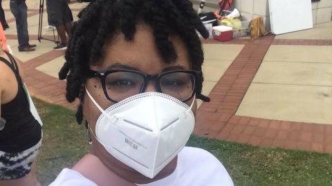 Kenya Goodson registers voter and assists with the Census count at the Government Plaza in Tuscaloosa, Alabama.