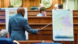 Sen. Rodger Smitherman compares U.S. Representative district maps during the special session on redistricting at the Alabama Statehouse in Montgomery, Ala., on Nov. 3, 2021. The Supreme Court has put on hold a lower court ruling that Alabama must draw new congressional districts before the 2022 elections, boosting Republican chances to hold six of the state's seven seats in the House of Representatives. 