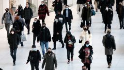 NEW YORK, NEW YORK - DECEMBER 13: People wear masks at an indoor mall in The Oculus in lower Manhattan on the day that a mask mandate went into effect in New York on December 13, 2021 in New York City. As parts of New York are seeing a surge in Covid cases, New York Governor Kathy Hochul has enacted a new mask mandate with fines up to $1,000 per violation. (Photo by Spencer Platt/Getty Images)