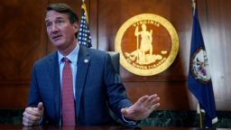 Virginia Gov. Glenn Youngkin, gestures during an interview in his office at the Capitol Tuesday Feb. 15, 2022, in Richmond, Virginia.