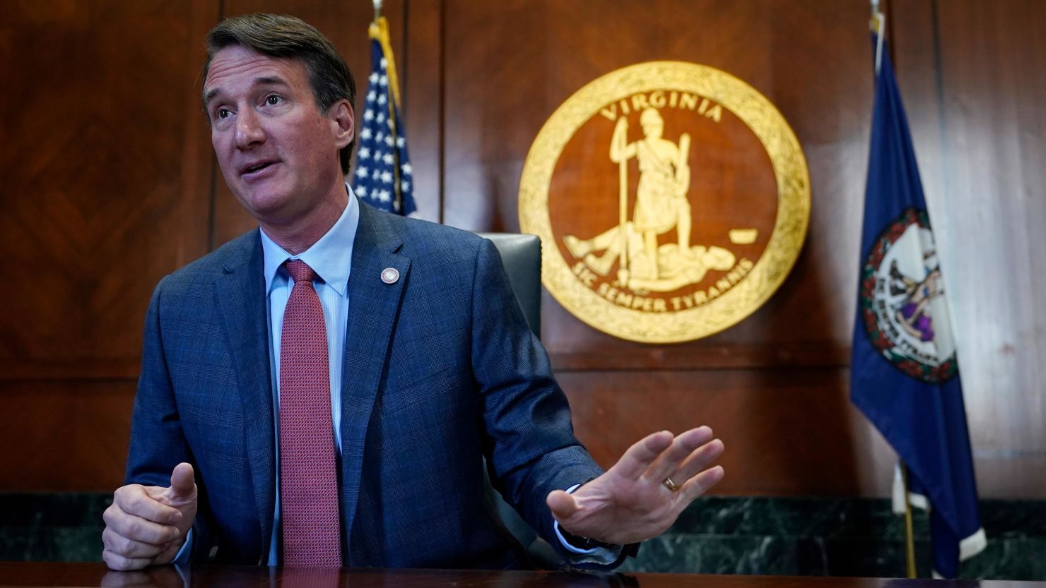 Virginia Gov. Glenn Youngkin, gestures during an interview in his office at the state Capitol on Tuesday, February 15, 2022, in Richmond, Virginia.