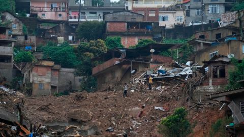 People search for victims of the landslides.