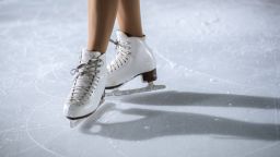 A woman figure skating