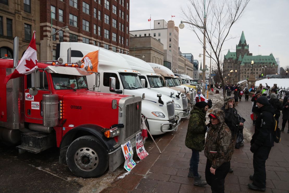 Trucks parked on Wellington Street, in front of Parliament Hill, during a demonstration in Ottawa, Ontario, Wednesday.