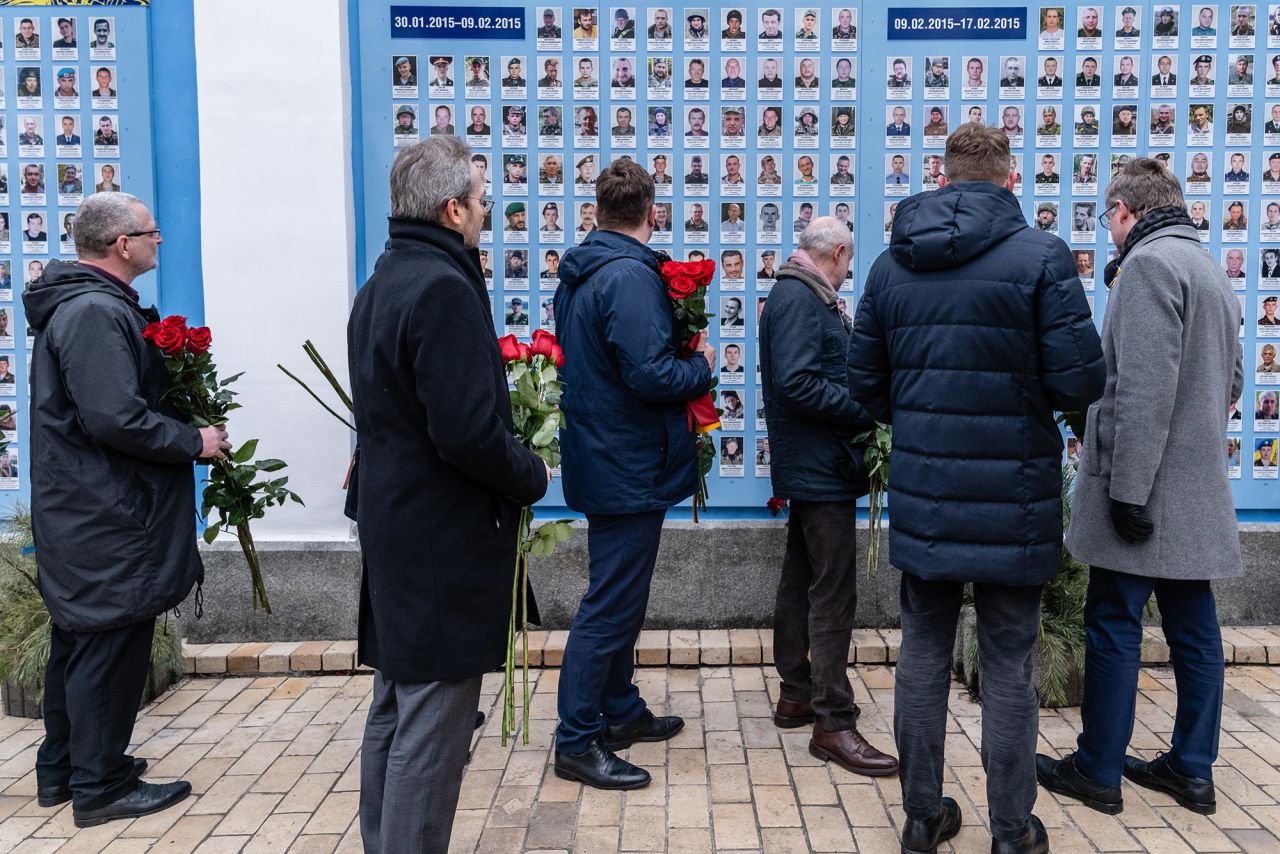 Ambassadors of European countries lay roses at the Wall of Remembrance in Kyiv on February 16. The wall contains the names and photographs of military members who have died since the conflict with Russian-backed separatists began in 2014.  Zelensky says Russia waging war so Putin can stay in power &#8216;until the end of his life&#8217; w 1280