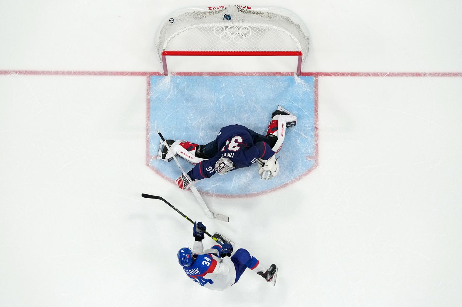 Slovakia's Peter Cehlárik beats American goalie Strauss Mann to <a href="https://www.cnn.com/world/live-news/beijing-winter-olympics-02-16-22-spt/h_892624466b5ffd54912780f1d72f9608" target="_blank">score what proved to be the winning shootout goal</a> in their quarterfinal game on February 16.