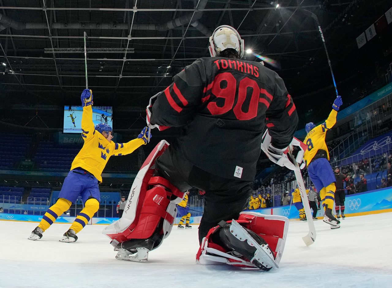 Swedish players celebrate after scoring against Canada during a quarterfinal hockey game on February 16. <a href="https://www.cnn.com/world/live-news/beijing-winter-olympics-02-16-22-spt/h_aacd5686eee40920e1f3695bf6762f84" target="_blank">Sweden defeated the reigning world champions 2-0.</a>