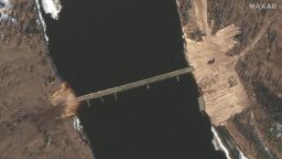 Satellite images taken over the past two days show new road construction and a tactical bridge being built across a key river in Belarus less than four miles from the Ukrainian border, amid what sources say is an ongoing buildup of Russian military forces encircling three sides of Ukraine.

Western intelligence and military officials are closely tracking the construction as part of the support infrastructure Russia is putting in place in advance of a potential invasion, three sources familiar with the matter told CNN. 

Both the new road construction and the bridge, across the Pripyat River in southern Belarus, are less than 4 miles from the border and could be used by Russian forces currently in Belarus in a drive to Kyiv, the Ukrainian capital. The satellite images, from Maxar and Planet, show the appearance of the pontoon bridge virtually overnight on Tuesday.