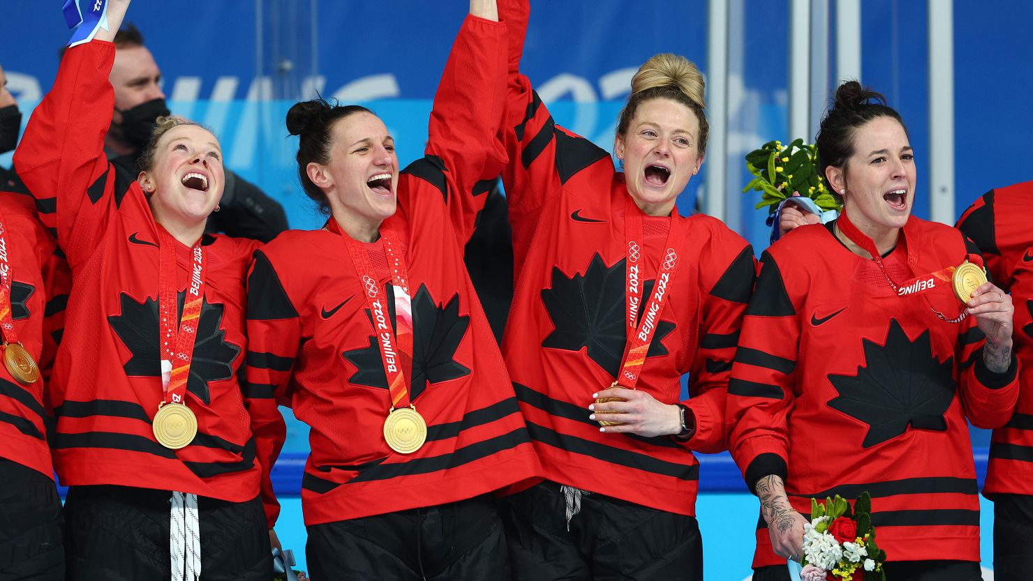 Gold medal winners Sarah Fillier, Jill Saulnier, Renata Fast and Melodie Daoust of Team Canada celebrate during the medal ceremony after the women's ice hockey final between Canada and the United States.