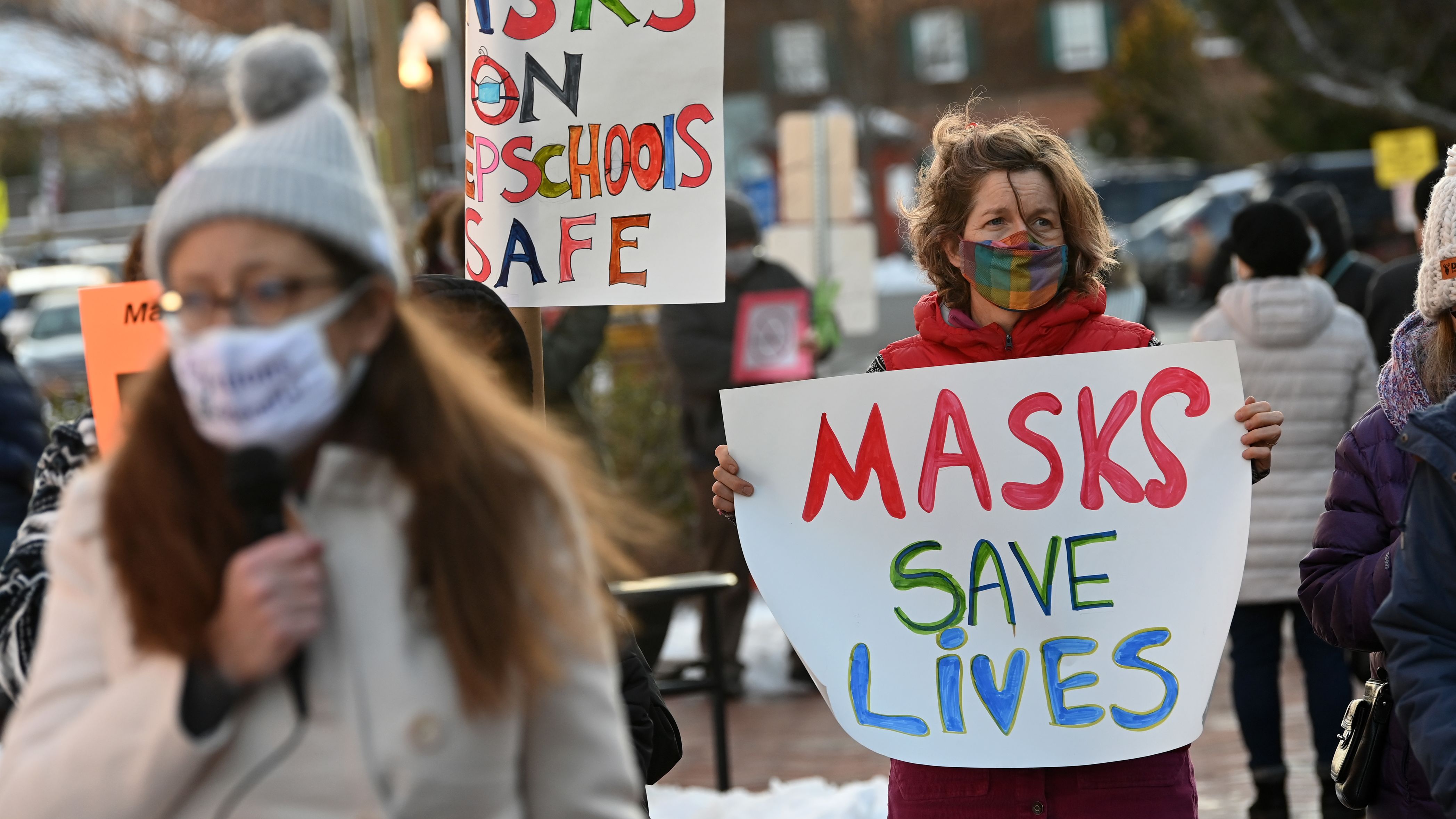  People gather in support of continuing the school mask mandate outside the Loudon County Government Center prior to a Board of Supervisors meeting on January 18, 2022 in Leesburg, Virginia. 