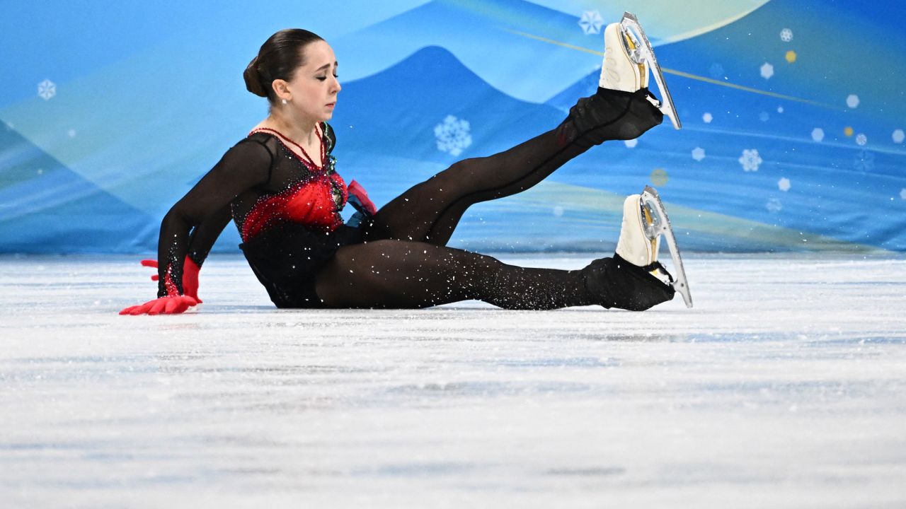 Russia's Kamila Valieva falls as she competes in the women's single skating free skating of the figure skating event during the Beijing 2022 Winter Olympic Games at the Capital Indoor Stadium in Beijing on February 17, 2022.