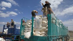 Yemen's Houthi rebels dispose of expired aid packages from the World Food Programme (WFP) in the capital Sanaa in 2019.