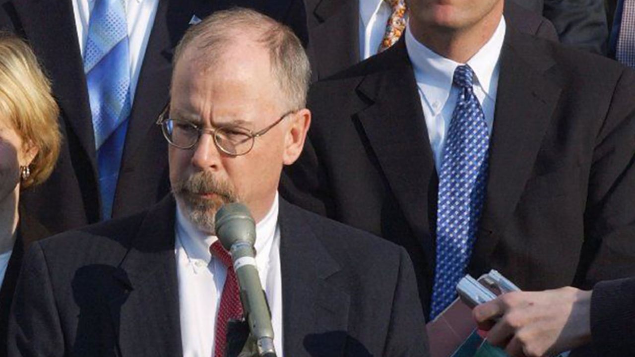 U.S. Attorney John Durham, center, outside federal court in New Haven, Connecticut in February 2021