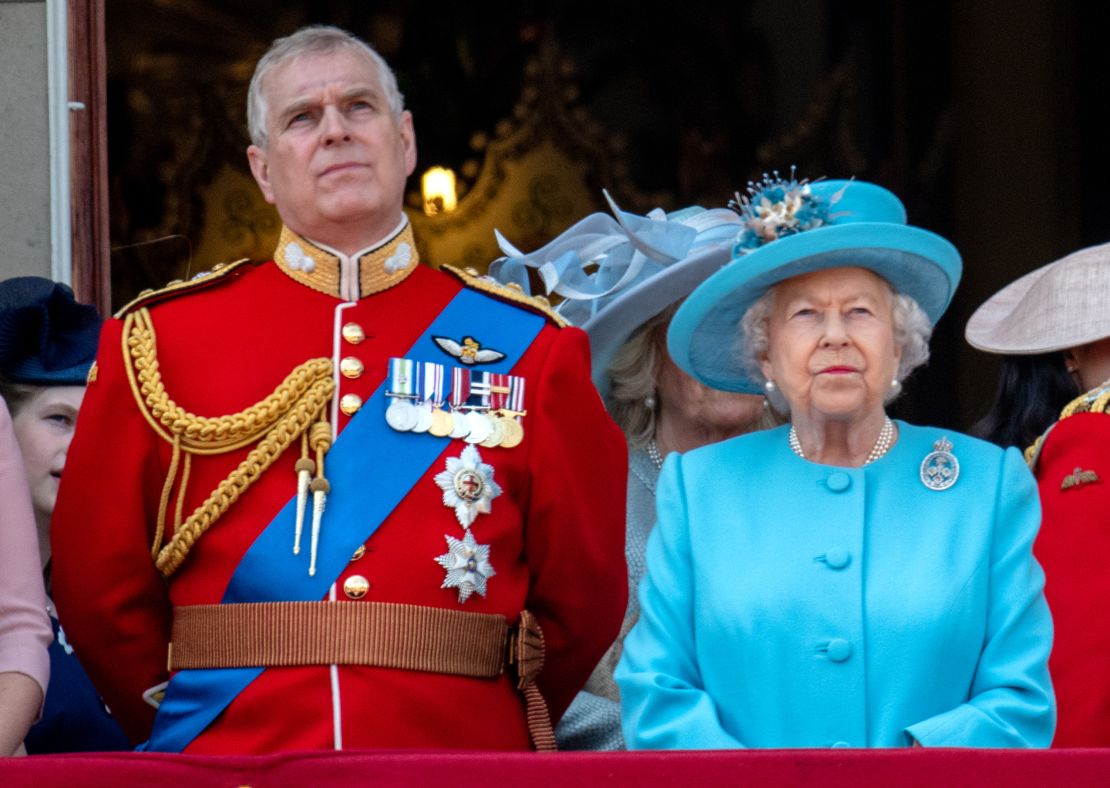 Mother and son watch the Trooping The Colour parade in 2018.