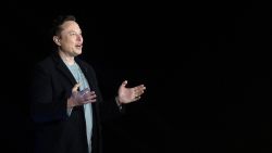 Elon Musk gestures as he speaks during a press conference at SpaceX's Starbase facility near Boca Chica Village in South Texas on February 10, 2022.