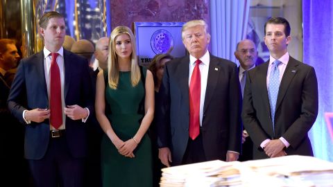 Then-President-elect Donald Trump along with his children Eric, left, Ivanka and Donald Jr. arrive for a press conference January 11, 2017 at Trump Tower in New York.
