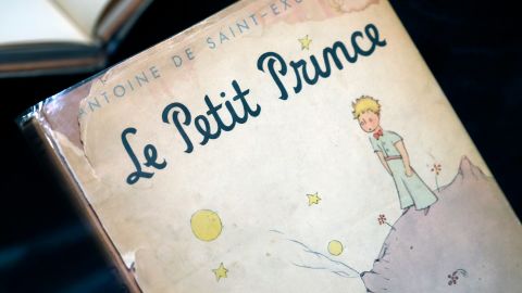 The French edition of the cover of Antoine de Saint-Exupery's book dedicated to the Little Prince is on display during the exhibition titled "A la Rencontre du Petit Prince" at Musee des Arts Decoratifs on February 16, 2022 in Paris, France. 