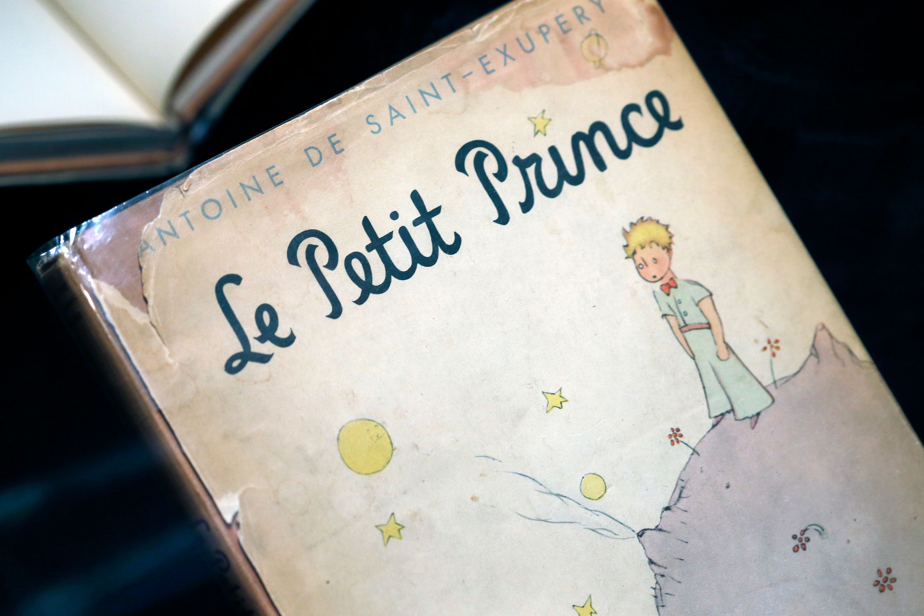 an encounter with the petit prince: original pages now on view in paris
