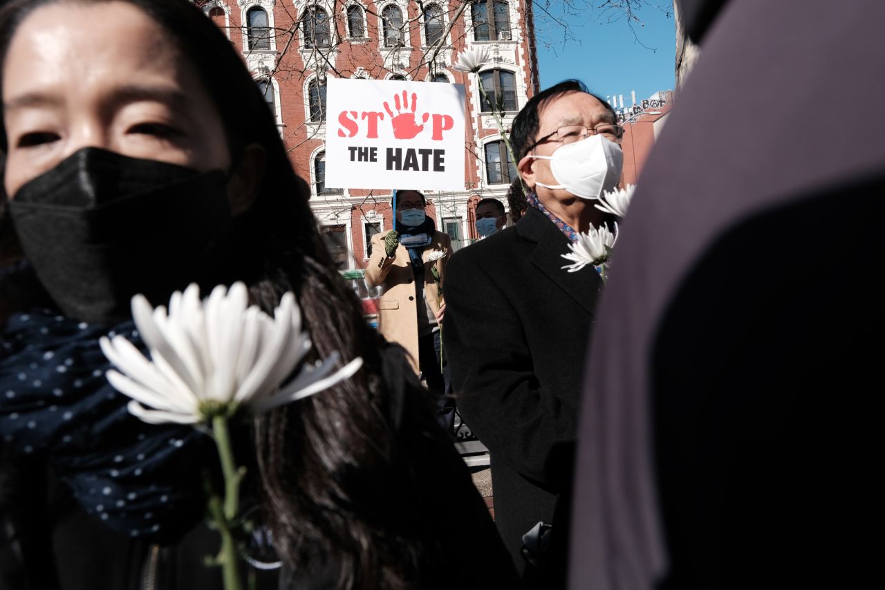 People hold a rally Tuesday, February 15, near the building where Christina Yuna Lee was killed a couple of days earlier in New York. <a href="https://www.cnn.com/2022/02/15/us/new-york-woman-stabbed-chinatown/index.html" target="_blank">A man has been charged with murder</a> after he allegedly followed the 35-year-old Lee to her apartment and stabbed her dozens of times with a knife, prosecutors say. It's not clear whether Lee's race or ethnicity played a role in the attack, or whether the New York Police Department's Hate Crimes Task Force is involved in the investigation, but the killing of an Asian woman in Chinatown has again raised fears in New York and across the country where Asians have been affected by an increase in anti-Asian violence in recent years, advocates say.