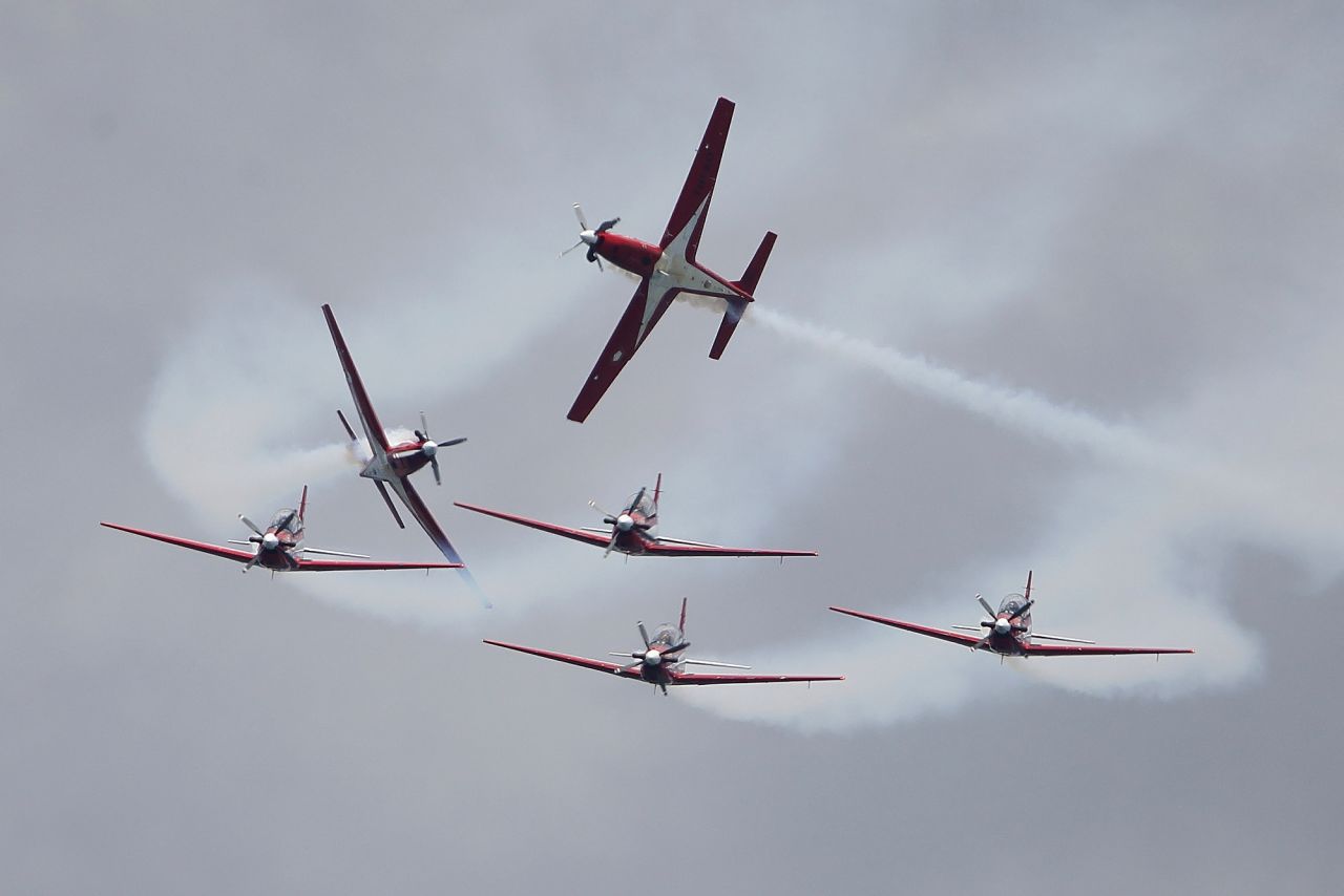 The Indonesian Air Force's Jupiter Aerobatic Team performs at at air show in Singapore on Tuesday, February 15.