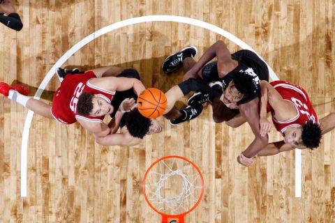 From left, Indiana's Race Thompson, Michigan State's Malik Hall and Julius Marble, and Indiana's Trayce Jackson-Davis eye a rebound during a college basketball game in East Lansing, Michigan, on Saturday, February 12.