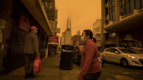 Smoke hangs in the air in San Francisco in 2020 as destructive wildfires sweep across California. Communities of color are more likely to be on the front lines of the climate crisis, studies have found.
