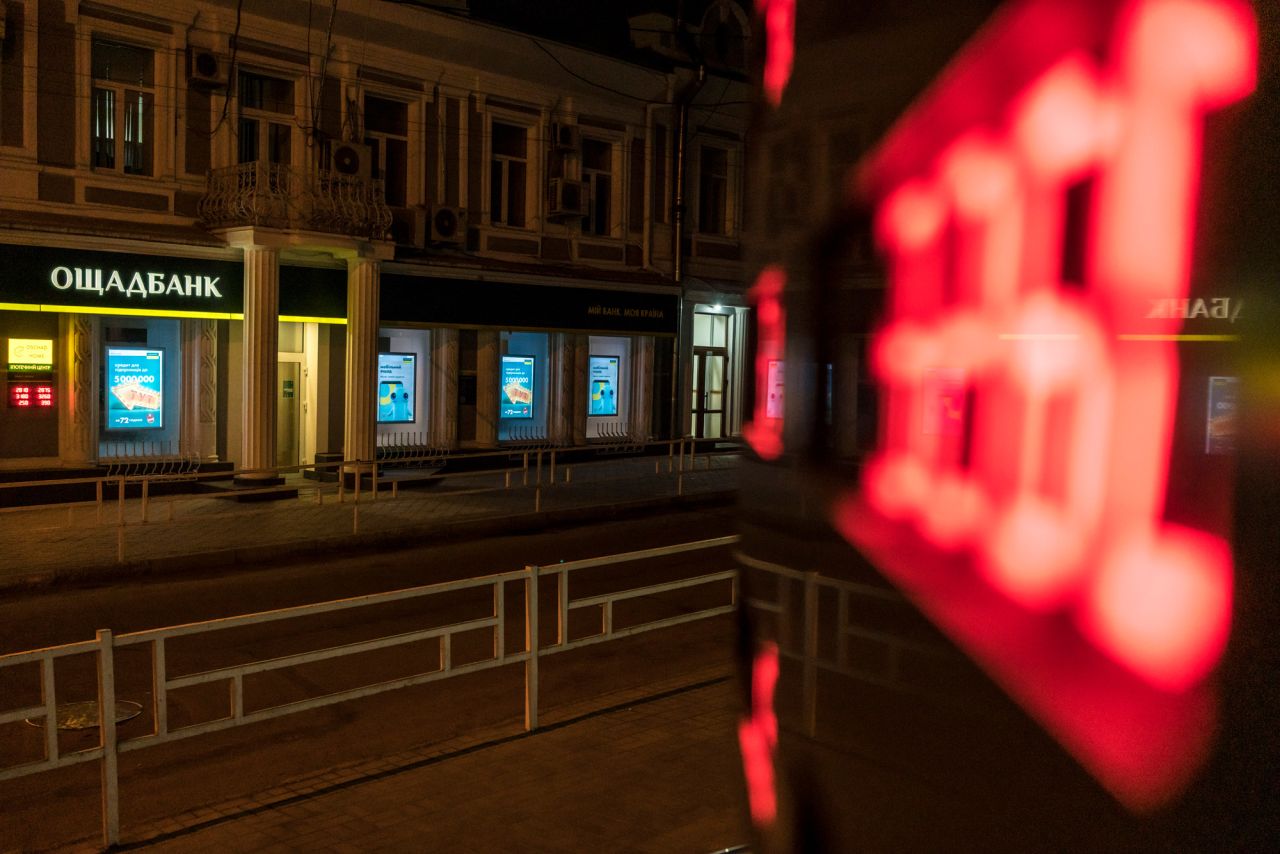 A location of Oschadbank, a state-owned bank, is seen in Kyiv, Ukraine, on Tuesday, February 15. The websites of Oschadbank and PrivatBank, the country's two largest banks, <a href="https://www.cnn.com/2022/02/15/world/ukraine-cyberattack-intl/index.html" target="_blank">were hit by cyberattacks that day,</a> as were the websites of Ukraine's defense ministry and army, according to Ukrainian government agencies.